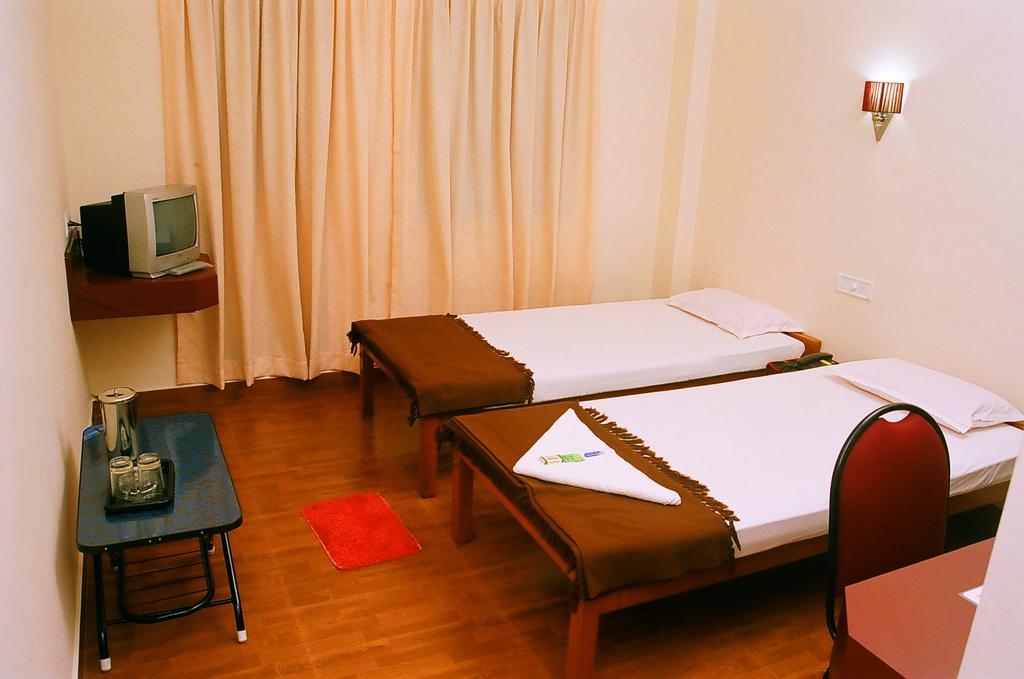 Hotel Srinivas Kochi Szoba fotó